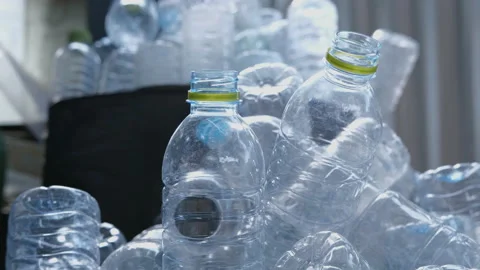 Used plastic drinking water bottles included for recycling Stock Footage 142704433