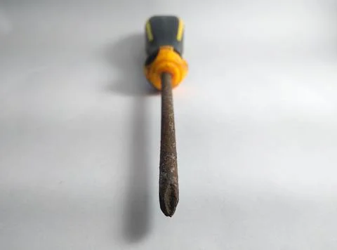 Used screwdriver that has started to rust Stock Photos