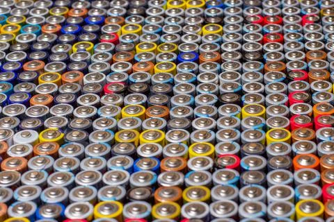 Used in several rows arranged AAA batteries of different colors and manufactu Foto stock