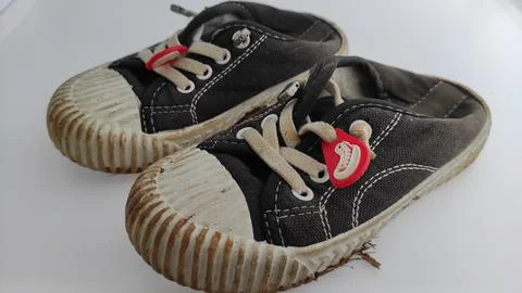 Used shoes on white background Foto stock