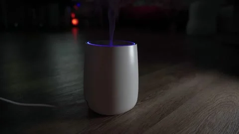 Used ultrasonic aromatherapy oil diffuser. Sprayed water droplets thrown into Stock Footage 165674049