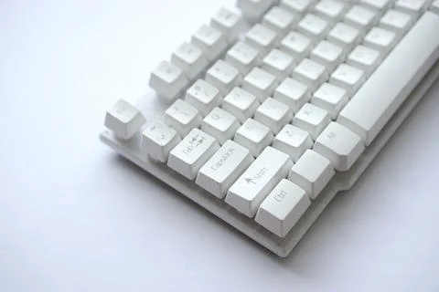 Used white computer keyboard that is not used until it gets dusty Stock Photos