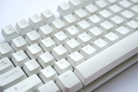 Used white computer keyboard that is not used until it gets dusty Foto stock