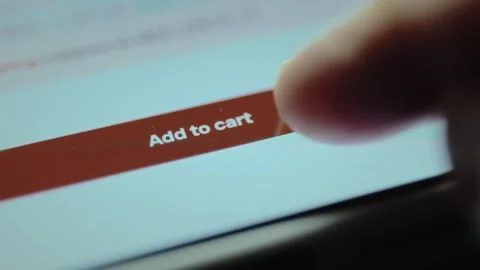 User about to tap the button Add to cart. E shopping concept Stock Footage 327899446