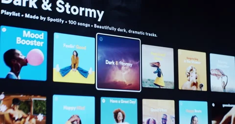 User Browsing Music Streaming Spotify App On a Smart Device Stock Footage 200925582