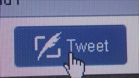 User clicks Tweet button and camera dolly away (extreme close up) Stock Footage 49672845