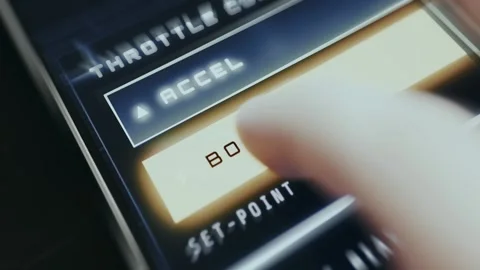 User enables BOOST mode on a digital pedal calibration screen Stock Footage 335474599