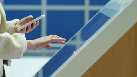 User engages with interactive digital display Stock Footage 345676960