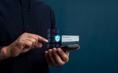 User entering OTP verification code on smartphone with shield icon. Two-fac.. Stock Photos