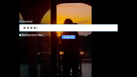 User enters password on website with a mother and child in the background Stock Footage 346710479