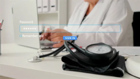 User enters password on website sign in form with doctor background image Stock Footage 334023037