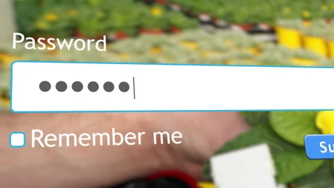 User enters password on website while surrounded by flowers in greenhouse Vídeos de archivo 334022529