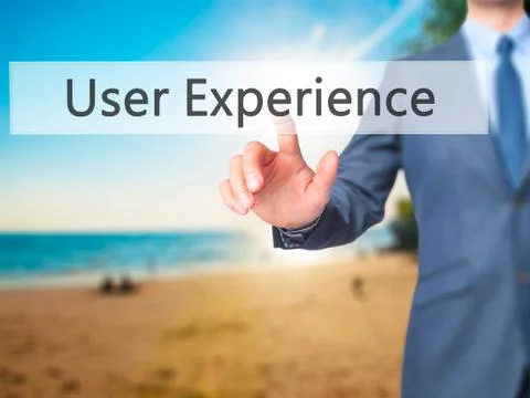 User Experience -  Businessman click on virtual touchscreen. Stock Photos