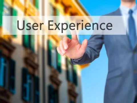 User Experience -  Businessman click on virtual touchscreen. Stock Photos