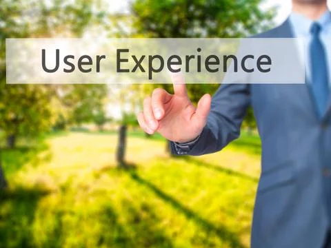 User Experience -  Businessman click on virtual touchscreen. Stock Photos
