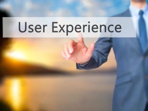 User Experience -  Businessman click on virtual touchscreen. Stock Photos