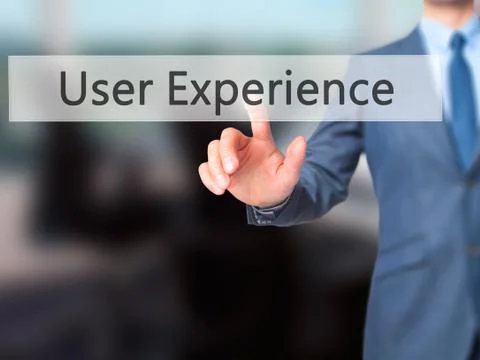 User Experience -  Businessman click on virtual touchscreen. Stock Photos