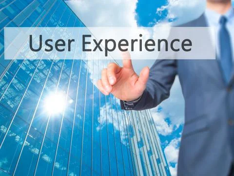 User Experience -  Businessman click on virtual touchscreen. Stock Photos