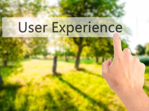 User Experience - Hand pressing a button on blurred background concept on vis Stock Photos