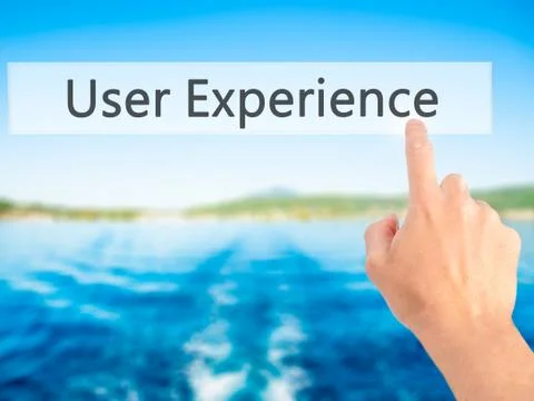 User Experience - Hand pressing a button on blurred background concept on vis Stock Photos