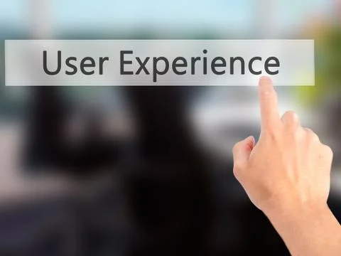 User Experience - Hand pressing a button on blurred background concept on vis Stock Photos