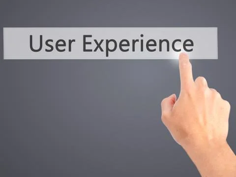 User Experience - Hand pressing a button on blurred background concept on vis Stock Photos