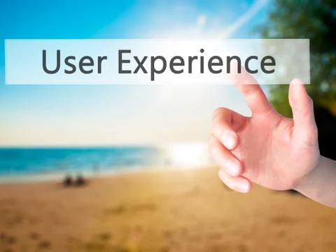 User Experience - Hand pressing a button on blurred background concept on vis Stock Photos