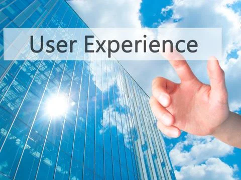 User Experience - Hand pressing a button on blurred background concept on vis Stock Photos