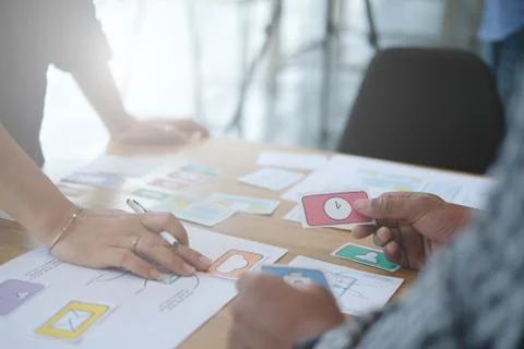 User experience UX designer designing web on smart phone layout. UI developer Stock Photos