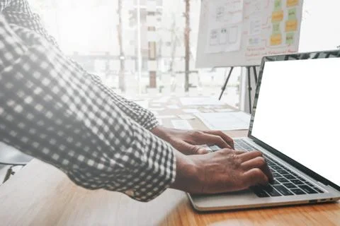 User experience UX designer designing web on smart phone layout. UI developer Stock Photos
