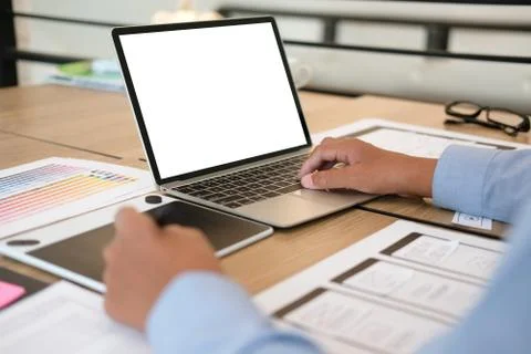 User experience UX designer designing web on smart phone layout. UI developer Stock Photos