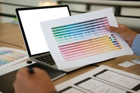 User experience UX designer designing web on smart phone layout. UI developer Stock Photos