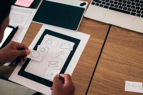 User experience UX designer designing web on smart phone layout. UI developer 스톡 사진
