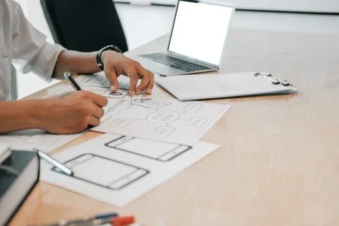 User experience UX designer designing web on smart phone layout. UI developer 写真素材