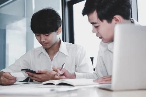 User experience UX designer designing web on smart phone layout. UI developer Stock Photos