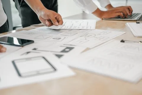 User experience UX designer designing web on smart phone layout. UI developer 스톡 사진