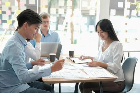 User experience UX designer designing web on smart phone layout. UI developer Stock Photos