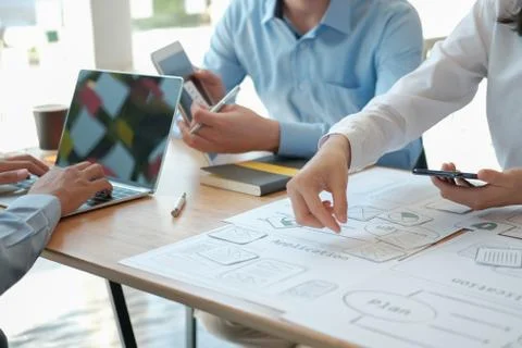 User experience UX designer designing web on smart phone layout. UI developer 写真素材