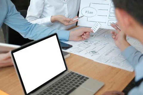 User experience UX designer designing web on smart phone layout. UI developer Stock Photos