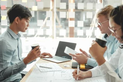 User experience UX designer designing web on smart phone layout. UI developer Stock Photos