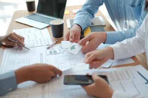 User experience UX designer designing web on smart phone layout. UI developer 写真素材