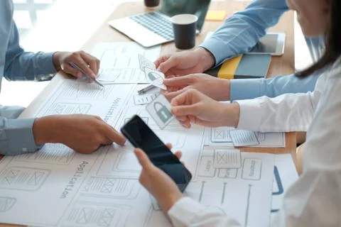 User experience UX designer designing web on smart phone layout. UI developer 스톡 사진