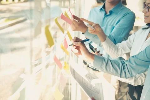 User experience UX designer designing web on smart phone layout. UI developer Stock Photos