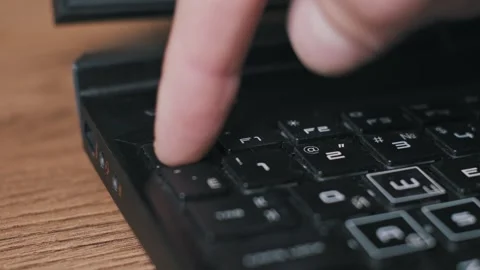 User Finger Repeatedly Tapping ESCAPE Key Stock Footage 322146961