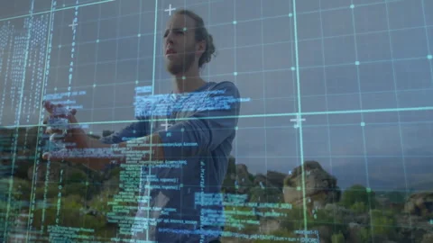 User holding phone initializing holographic grid, dragging code panels for Stock Footage 311084788