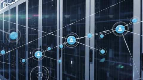 User icon fading in activating network graph expanding over data racks showing Stock Footage 312898627