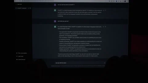 User interacting on a laptop with ChatGPT chat bot prompt command. Stock Footage 231172408