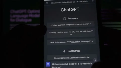 User interacting on a Smartphone with ChatGPT prompt - birthday. Stock Footage 231172543