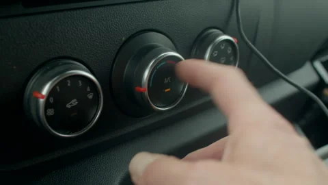 User interacts with dashboard to modify airflow and temperature settings Stock Footage 325073901