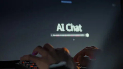 A user interacts with a sophisticated AI model through a keyboard interface Stock Footage 331315114